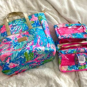 Lilly Pulitzer overnight bad, with matching toiletries bag and mirror included.
